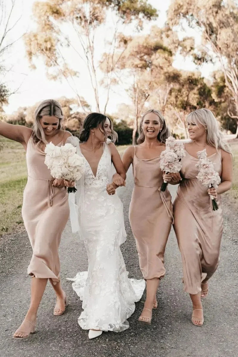 champagne silk bridesmaid dresses A-Line V-Neck Straps Long Stretch Satin Bridesmaid Dresses With Split The look is complete with a pleated mermaid skirt and leg slit. Sheath Cowl Neck Champagne Silk